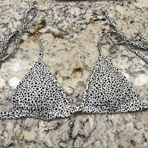 Super cute white & black speckled bikini top with adjustable tie straps.